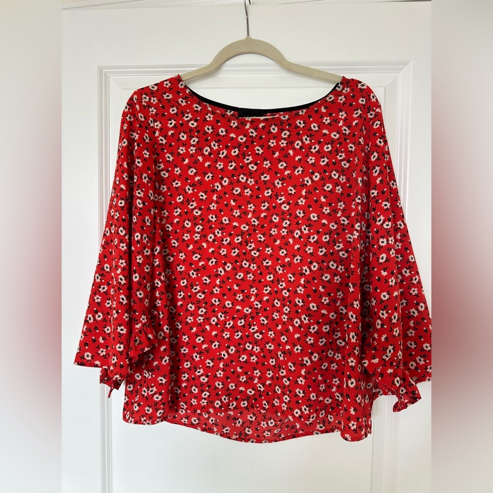 Red floral asymmetric sleeved blouse